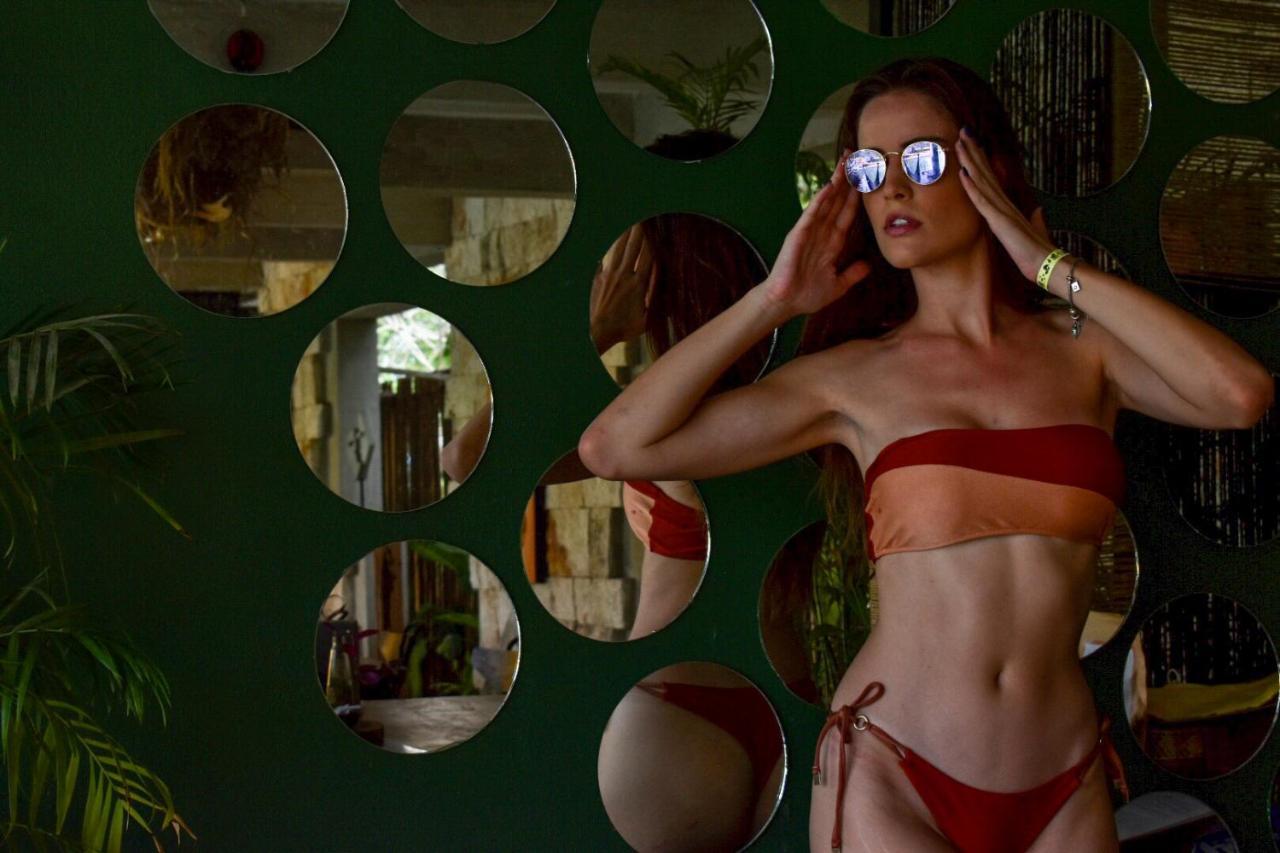 Hotel Makaaba Eco-Boutique Bacalar Eksteriør bilde A model wearing a two-piece swimsuit