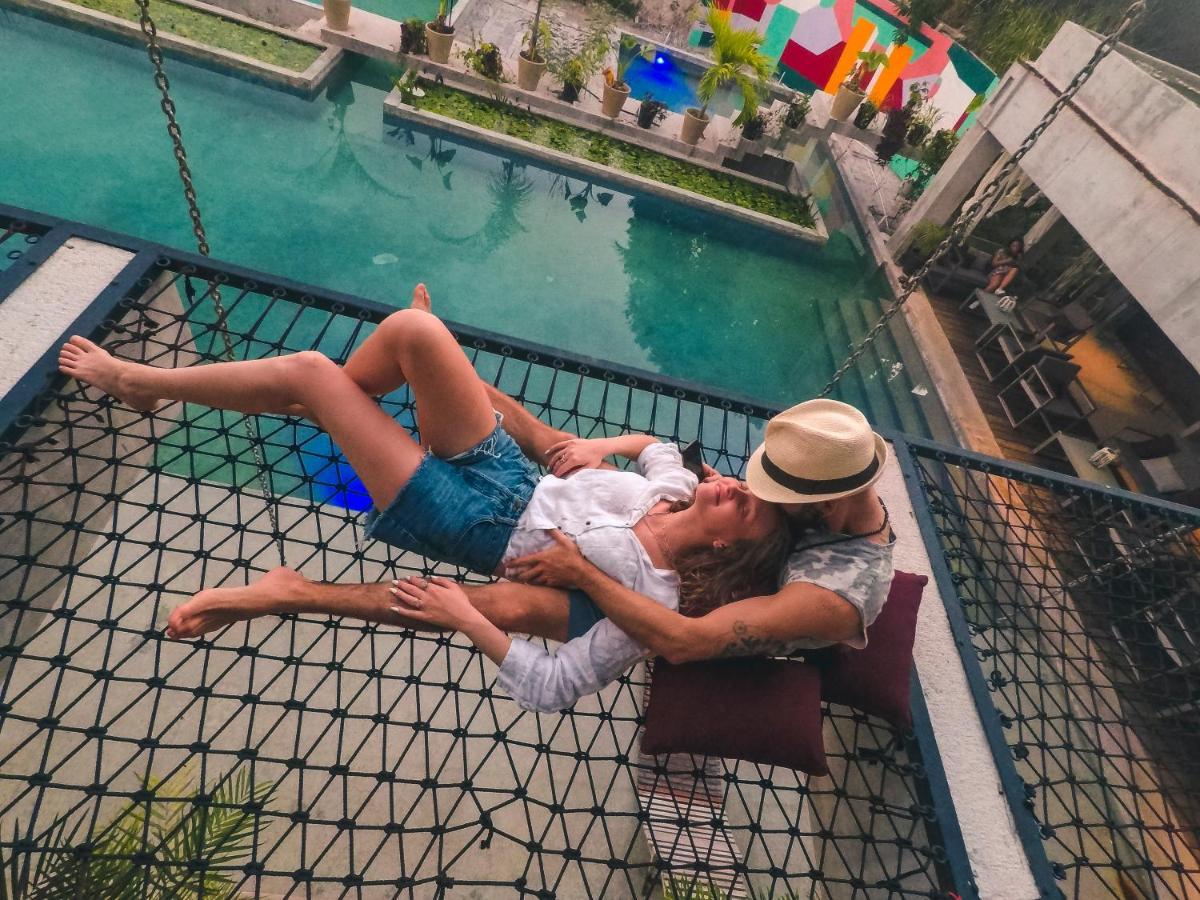 Hotel Makaaba Eco-Boutique Bacalar Eksteriør bilde A couple on a hammock